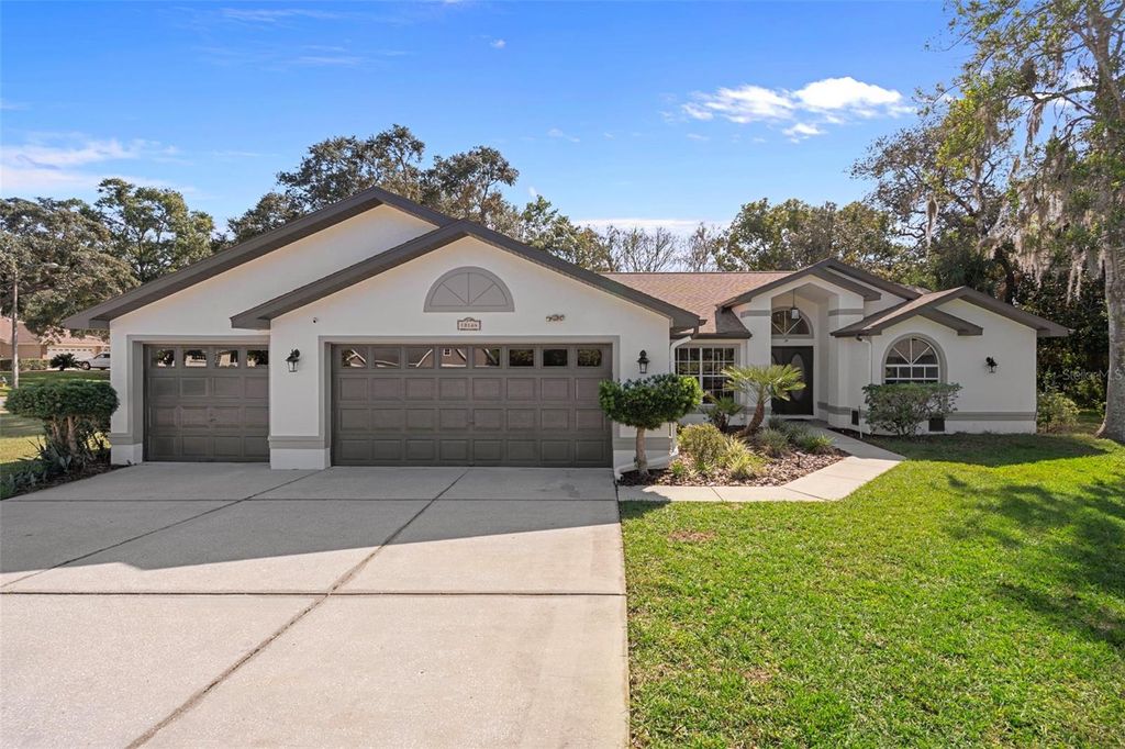 Photo of 18164 Winding Oaks Boulevard, Hudson, FL 34667 (MLS # TB8446963)