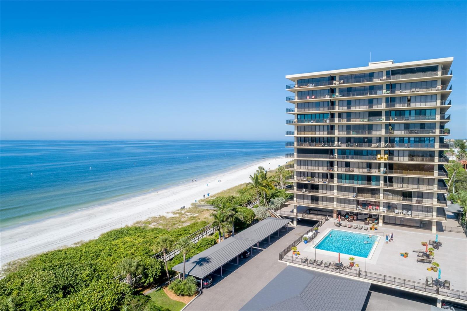 ANNUAL FURNISHED RENTAL 6-12 MONTHS- RENTAL RATE IS DISCOUNTED DUE TO CONSTRUCTION, Mansions is known for spectacular views from their generous balcony! BEAUTIFUL LONG TERM RENTAL ON THE BEACH!! This luxury 2 bedroom, CORNER UNIT is tastefully furnished and fully equipped for your leisure. Complete renovation in 2023 superbly done. Brand new features throughout including new luxury vinyl panel flooring, new stainless steel kitchen appliances, new baths, and a tasteful neutral color scheme for modern charm. Split floor plan with both bedrooms having private bathrooms and amazing views of the gulf! The main living area is large and wide open; perfect for entertaining. The wonderful complex has a heated pool, clubhouse, tennis courts, work out room, 1 under building parking, security and the BEACH! Located at the end of Sunset Beach in Treasure Island, there is no through traffic and a semi-private beach. A convenient drive to Florida's major attractions! Disney, Busch Gardens, Sea World, etc. Good restaurants are in abundance within short drive. Lots of diverse local shopping as well as great nearby shops and malls! For the beach lover- The beautiful gulf with its warm blue clean waters is at your back door. The beach provides the perfect playground for beach volleyball, walking, jogging and looking for shells. SCHEDULE YOUR SHOWING TODAY!
