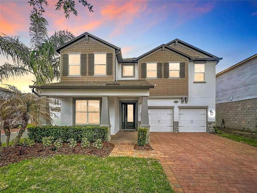 Stunning and beautifully upgraded home located in the highly desirable Winter Garden area, offering the perfect blend of luxury, space, and outdoor living. This impressive residence features a modern open-concept layout with expansive living areas, elegant tile flooring, and abundant natural light throughout. The gourmet kitchen is a true centerpiece, complete with a large quartz island, stainless steel appliances, custom cabinetry, and a gas cooktop, seamlessly flowing into the main living and dining spaces—ideal for both everyday living and entertaining. The home showcases designer finishes including tray ceilings, custom wall accents, and a built-in entertainment wall, along with a spacious owner’s suite featuring a spa-like bathroom with dual vanities and a walk-in shower. Step outside to your private backyard oasis with a covered lanai, resort-style pool, fire pit area, and pergola—perfect for relaxing or hosting gatherings. Located in a well-maintained community with a pool and amenities, and just minutes from major highways, shopping, dining, and top-rated schools, this home offers both convenience and an exceptional lifestyle in one of Central Florida’s most sought-after locations.