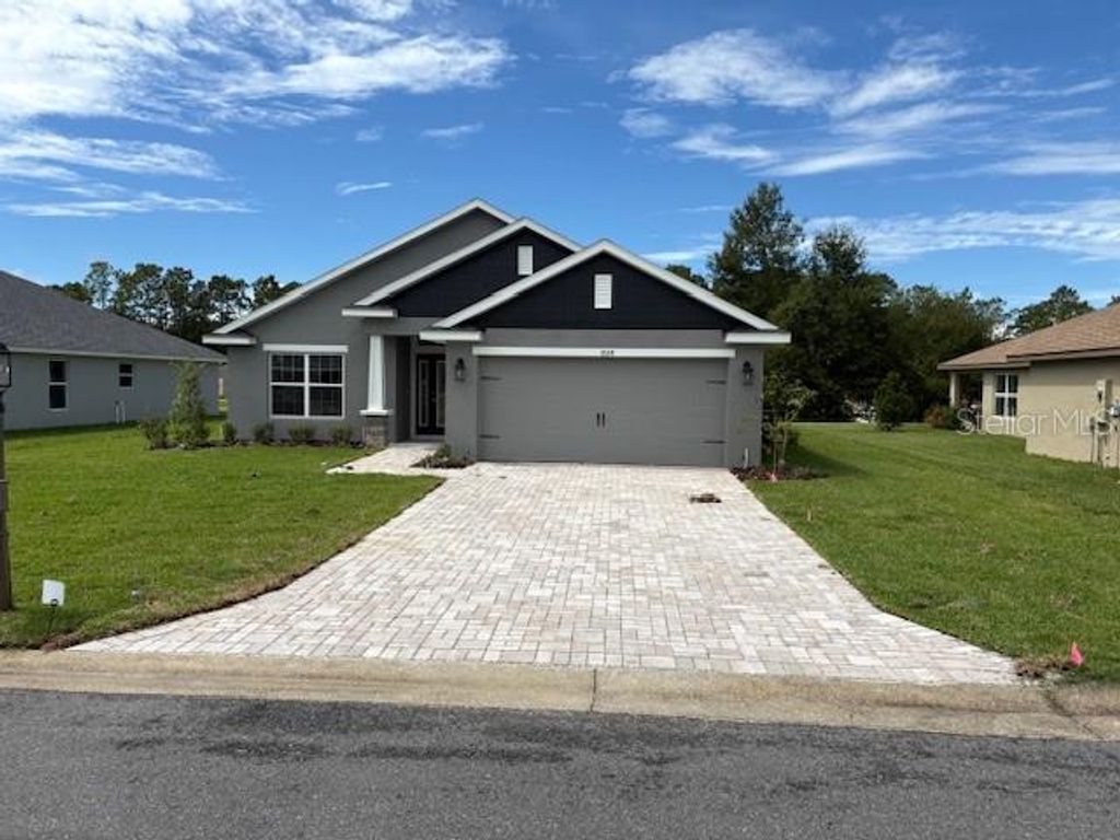 Photo of 7128 SW 179th Court Road, Dunnellon, FL 34432 (MLS # OM710418)
