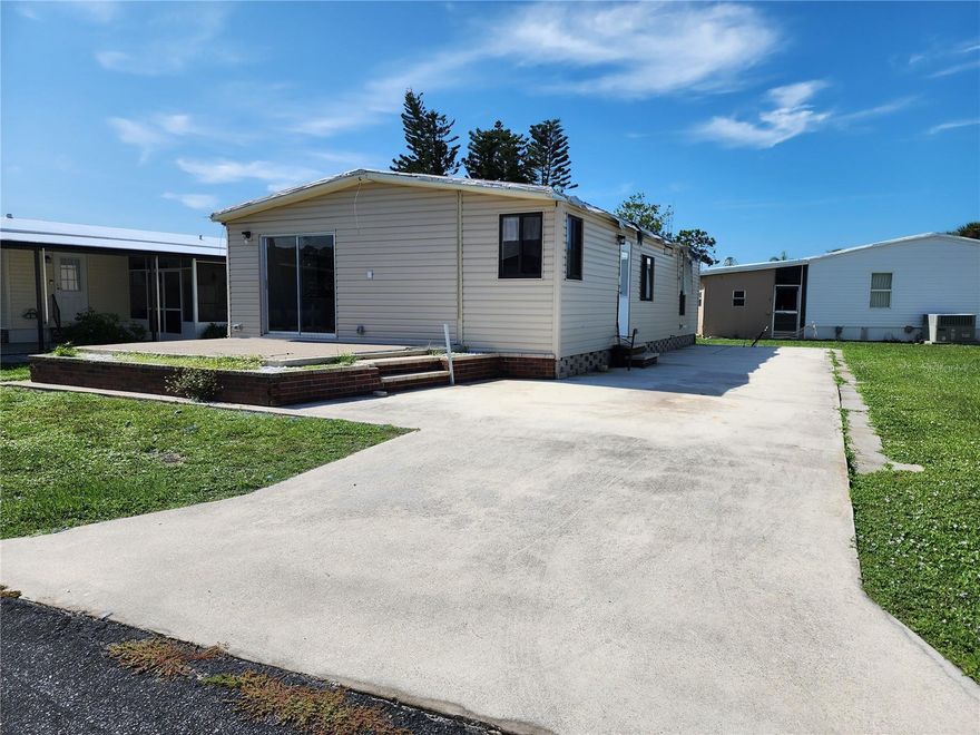 Opportunity Awaits! Welcome to this active 55 and older community of Polynesian Village, located approximately one mile to Manasota Beach and boat ramps!  Extra Storage available for your boat, RV or trailer or space for shed/storage at 130/yr.  And you can't beat the Location! You can walk, drive or bike to the beach. Polynesian Village amenities include a community pool, sun deck, 3 shuffleboard courts and a beautiful newly remodeled gathering room/clubhouse that hosts many entertainment events planned by the social community for fun activities and camaraderie. This is a Golf Cart friendly community so bring your golf cart. This 2 bedroom, 2 bath home suffered damage from the hurricane and lost the carport along with a Lanai; there is a slab/foundation for the sun porch in the front of the home. This model offers a great open floor plan creates a feeling of a large open living space.  The home has several updates done prior to the storm including Roof; Updated Electric to bring to code and also all new plywood subflooring per seller.  There is damage from the hurricane (See photos) and it has been priced accordingly. This listing provides an affordable opportunity to own in this wonderful community. Call today!