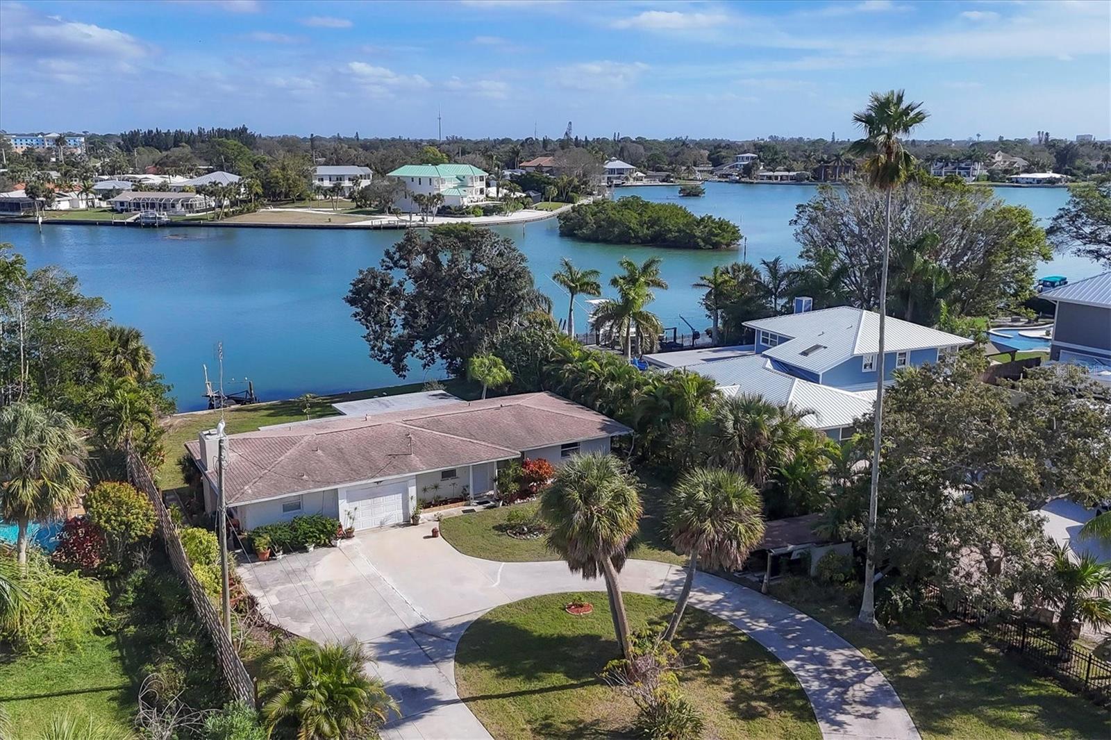 LOCATION! LOCATION! LOCATION ! WATERFRONT! Minutes to Walk From the NOKOMIS BEACH!PUBLIC WATER! NO HOA! NO CDD! Set back from the road, this residence has a nearly-acre lot located directly on Lyons Bay and is within a minute's walk from the beach.The location and lot are superior. With a little TLC, this home will shine. Public water is connected! The house has an in-law suite! Walk to the beach, Pop's Sunset Grill, Bentley's ice cream, and more!The peaceful waterfront community of Venice and Englewood sits on Florida’s west coast, overlooking the Gulf of Mexico. Originally established to provide lemon groves, the town retains a natural Old Florida feel, with few buildings reaching higher than three or four stories. Fort Myers and Sarasota lie within commuting distance, and Sarasota Bradenton International Airport lies just 30 miles away.Dotted with charming 50s-style beach homes and vibrant apartment rentals, the area is absolutely essentially Florida. Back on the mainland, you'll find plenty of golf courses and several parks where residents and visitors can enjoy outdoor activities such as fishing, cycling, and kayaking. With its stunning, unspoiled beaches and a pleasant year-round climate, you’ll feel as though you’re on a permanent vacation. Do not miss this endless opportunity to own a piece of paradise!