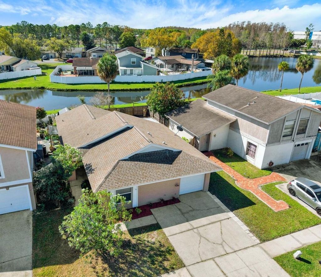 Photo of 10320 Fernbrook Lane, Tampa, FL 33624 (MLS # TB8484139)