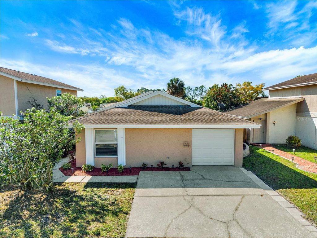 Photo of 10320 Fernbrook Lane, Tampa, FL 33624 (MLS # TB8484139)