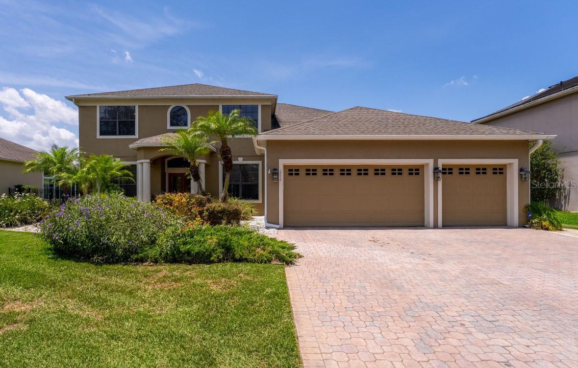 Don’t miss your chance to live in Oviedo's premier community, one of the most sought-after neighborhoods. The Santa Barbara III by Engle Homes remains a favorite layout, offering 5 spacious bedrooms and 3 full bathrooms, providing ample space for a growing family. As you step through the foyer, you'll immediately be greeted by an open, airy atmosphere filled with natural light. The kitchen is thoughtfully designed with plenty of cabinet and counter space and flows seamlessly into the large family room. A guest bedroom and full bathroom are conveniently located on the main level. Upstairs, you’ll find the Owner's Retreat, complete with a private bathroom featuring a separate shower, garden tub, and two walk-in closets, along with 3 additional spacious bedrooms and another full bathroom. The original screened porch has been transformed into a fantastic bonus room with a stunning view of the sparkling swimming pool. Picture the lasting memories you'll make hosting cookouts and enjoying refreshing poolside moments with family and friends next summer and for years to come! For birthdays and special occasions, you’re just a short walk to the community’s fantastic recreational center, playground, and pool, complete with a fun water slide. Additional amenities include another playground, as well as nearby baseball and soccer fields. Zoned for Seminole County A-rated schools and walking distance to Elementary and Middle school. Recent updates to the home include an A/C installed in 2022, a whole-house water filter system added in 2022, a new water heater in 2024, a new pool pump in 2024, and updated pool and hot tub lights in 2025. The kitchen has been recently updated with beautiful quartzite countertops. This home is a smart home, featuring a thermostat, doorbell, and light switches, all of which can be controlled remotely. The property is professionally maintained, including lawn care, pool service, garden upkeep, and pest control both inside and out. Welcome to Crane's Landing at Live Oak Reserve! Don't delay. Schedule your showing today!