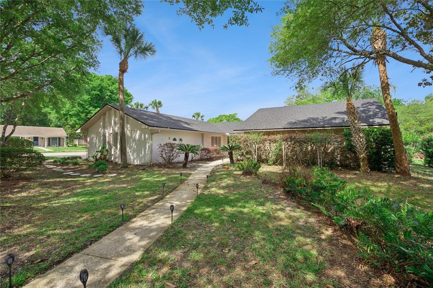 Under contract-accepting backup offers. Welcome to 306 Hickory Dr. in Longwood, Florida, nestled within the charming Sweetwater Oaks community. This inviting home is situated on an oversized corner lot, surrounded by mature landscaping and beautiful trees. Offering four bedrooms and two bathrooms, this well-maintained pool home exudes warmth and charm. As you enter, you are greeted by stunning views of the backyard pool area, creating a serene atmosphere. The master bedroom features two closets, along with a sunken tub and shower for added luxury. Throughout the living areas and bedrooms, you'll find stylish vinyl plank flooring. The family room is enhanced by a cozy wood-burning fireplace, and the indoor laundry room conveniently includes a washer and dryer. The kitchen seamlessly opens to the family room and boasts a refrigerator that is less than a year old. The roof was recently installed in 2024, ensuring durability for years to come. Residents of Sweetwater Oaks enjoy exclusive access to Lake Bradley, a large ski lake complete with a private boat dock, beach, and playground. The community also offers numerous tennis and pickleball courts, along with several parks and playgrounds. Additionally, this property is conveniently located near restaurants and the scenic Wekiva Springs State Park, alongside the picturesque Wekiva River. Situated on .41 acres, this home is sure to impress from the moment you step inside.