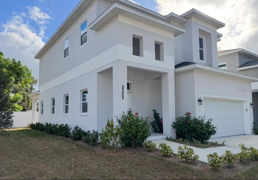 Welcome to your brand-new home in the heart of South Pinellas County. This modern, thoughtfully designed residence features a bright white kitchen with sleek solid-surface counters, beautifully crafted ceramic tile flooring, and a spacious layout perfect for everyday living and entertaining. The kitchen boasts a large granite prep island with space for barstools, plus a cozy breakfast nook ideal for casual meals.


The family room impresses with soaring ceilings and convenient storage tucked under the stairs. Upstairs, durable and stylish luxury vinyl plank flooring flows throughout, creating a clean and cohesive look. All bedrooms are generously sized and include walk-in closets, while the oversized laundry room—with its own utility sink—adds extra functionality to this perfect layout.

Situated just a short drive from Florida’s world-renowned beaches and only 20 minutes to Tampa International Airport, this home offers unmatched convenience. Enjoy top-notch dining, shopping, and entertainment options right nearby. Discover the ideal blend of comfort, style, and location.  Finishes on both homes (5312 and5302) are similar - tour specific home to see exact finishes for this beautiful property