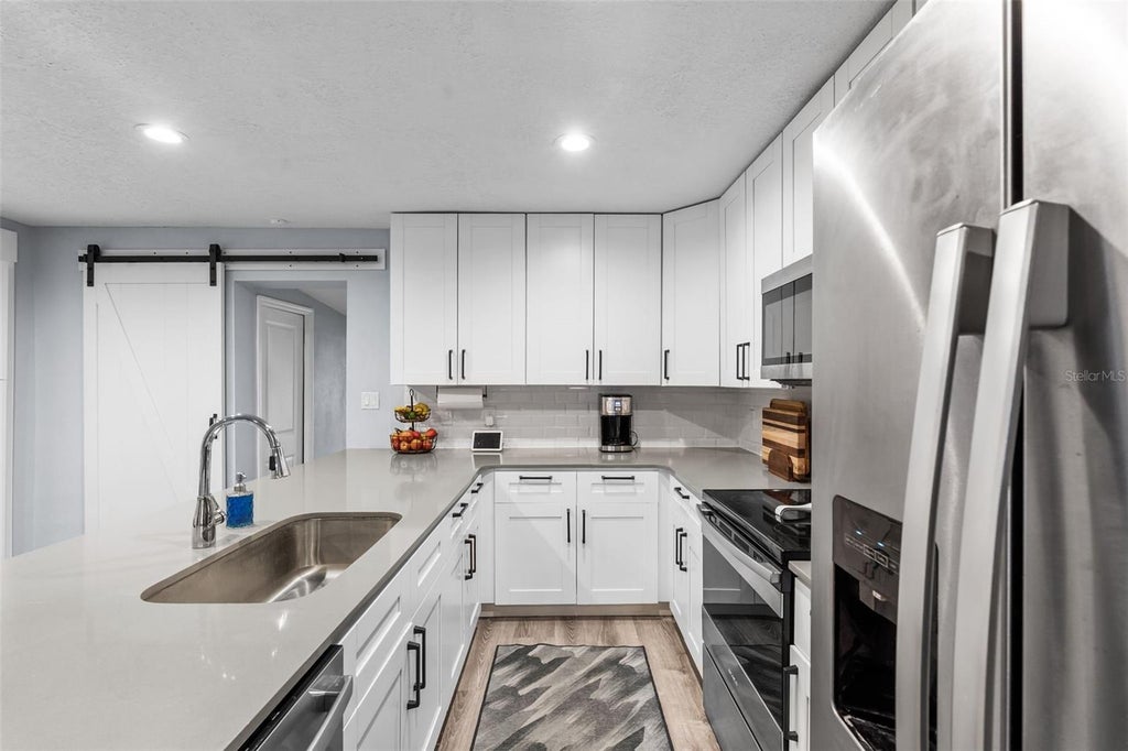 Photo of 1504 W Kirby Street, Tampa, FL 33604 (MLS # TB8524679)