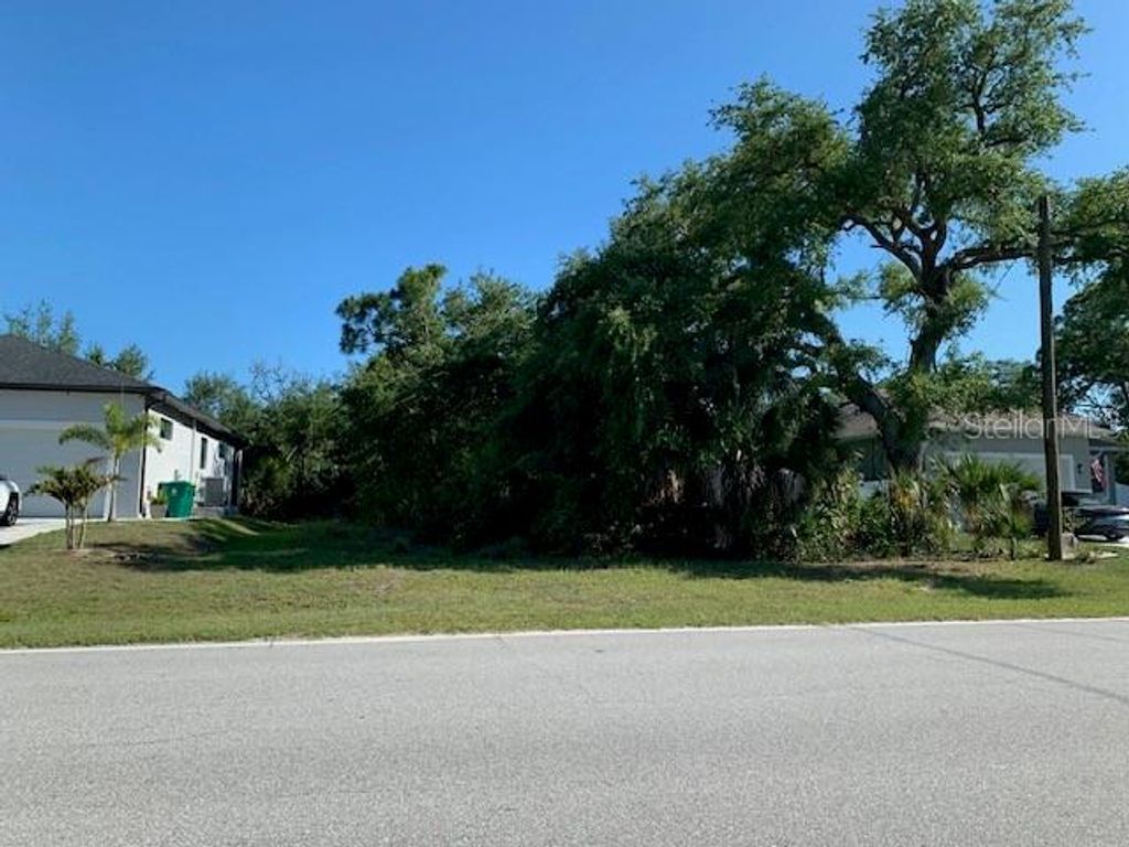 Photo of 137 Sunset Road, Rotonda West, FL 33947 (MLS # R4911232)
