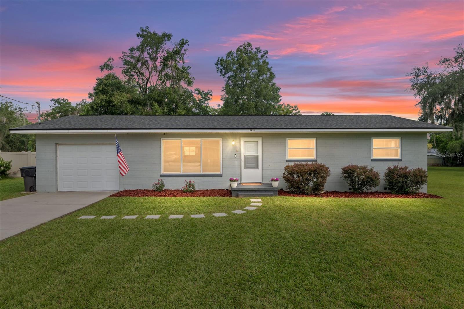 Beautiful, move-in ready home on a quiet cul-de-sac, situated on a nice-sized half-acre lot. Enjoy a vinyl privacy-fenced backyard with a covered porch, firepit area, and plenty of room to play. A 30x25 detached building/workshop with a 10-ft high garage door offers incredible flexibility—currently used as a playroom, gym, and flex space—with concrete floors, full insulation, a moveable AC unit, and a lean-to for boat or equipment storage. Inside, you’ll find original wood floors in most areas, laminate in the kitchen, and tile in the bath. The home features a great room, dining area, stainless appliances, neutral paint, and an attached garage. Plans for a master walk-in closet and bathroom addition are available to share with the buyer. Roof 2022. Located near Jim Kirk Park with trails, open green space, and a playground. Endless possibilities—don’t miss this one!