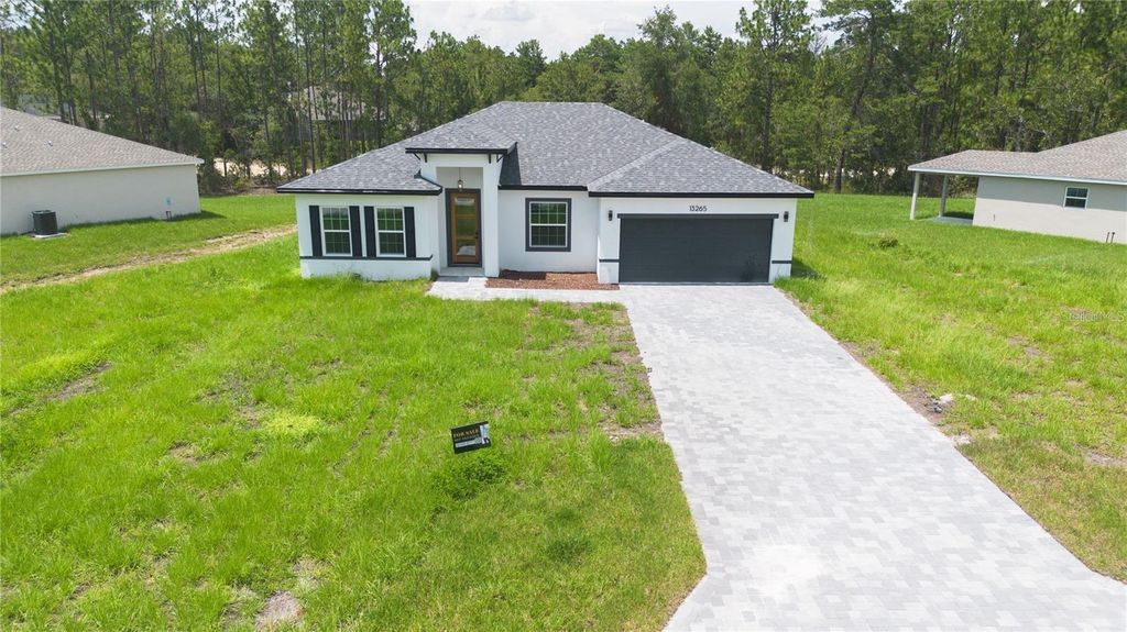 Photo of 13265 SW 85th Circle, Ocala, FL 34473 (MLS # O6359047)