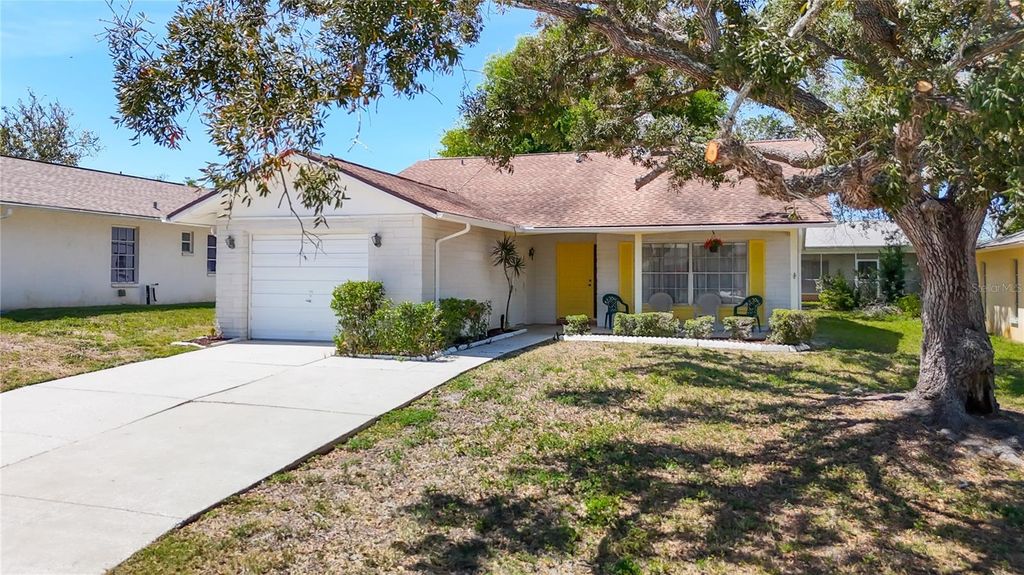 Photo of 10819 Los Santos Drive, Port Richey, FL 34668 (MLS # TB8371597)