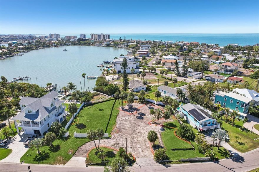 One or more photo(s) has been virtually staged. This is a rare true DOUBLE LOT opportunity to create a custom new-construction waterfront estate in the heart of Redington Beach! With over 30,000 square feet of prime property, this site provides limitless design potential — from a sprawling single estate with multiple outdoor living areas and a resort-style pool, to a luxury multi-structure compound or dual-home development (subject to zoning). Enjoy direct Intracoastal access- bring the boats, jet skis, and paddleboards — plus easy access to the Gulf of Mexico and the vibrant boating destinations of John’s Pass and Clearwater Beach. Situated in prestigious Redington Beach, residents enjoy the private beach access and resident-only parking No HOA or deed restrictions — full creative freedom for your build! Walking distance to the beach, and dining, and entertainment all close by. If you are seeking a rare waterfront development parcel or ready to build a custom coastal masterpiece, this property delivers unmatched size, access, and potential. Don’t miss your chance to build new on one of the largest waterfront lots in Redington Beach — opportunities like this are nearly impossible to find!