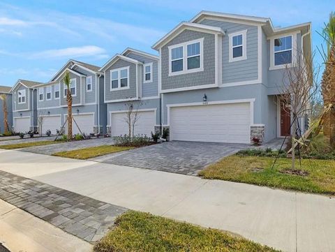 Photo of 31480 Woodland Race Loop, Wesley Chapel, FL 33545 (MLS # J989660)