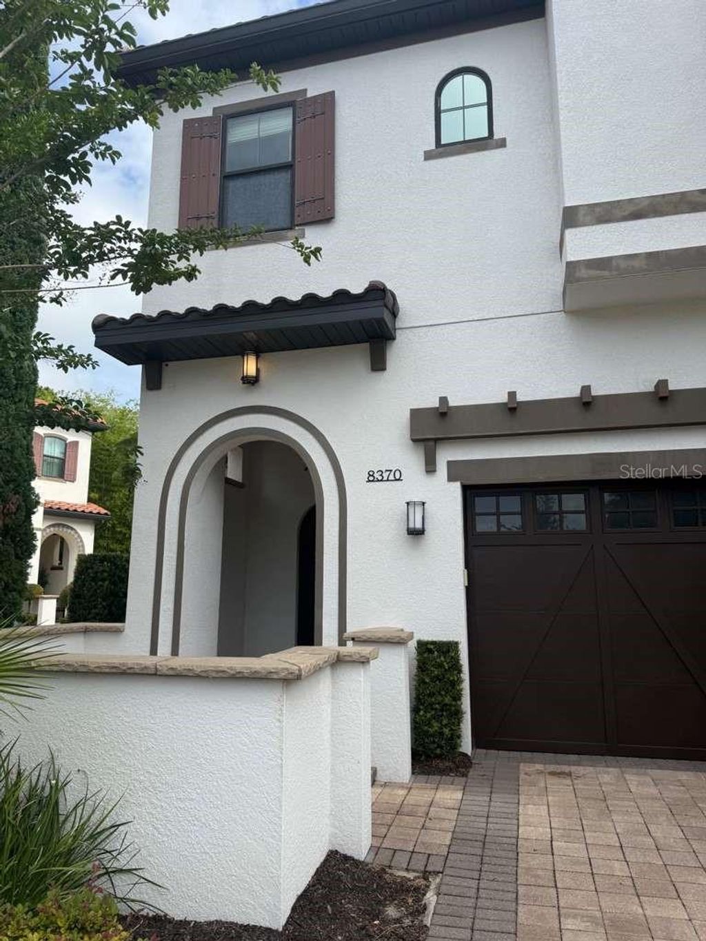 Photo of 8370 Via Vittoria Way, Orlando, FL 32819 (MLS # O6390105)
