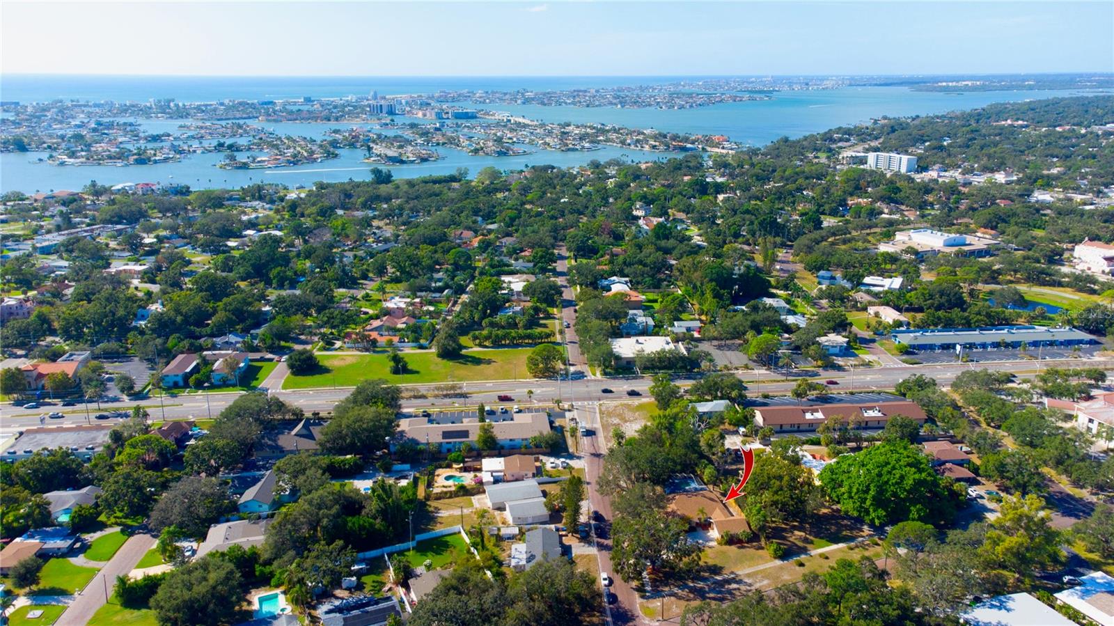 Pool home, large modern kitchen, granite counters, stainless steel appliances. New roof-AC-windows-heated pool-huge living room, spacious bedrooms, wet bar, sunroom with AC. Ample storage. Big yard, boat gate, 6-car drive, laundry rm, 2nd frig, Home Warranty.