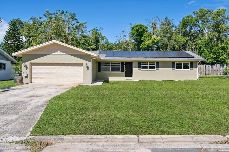 FUN POOL HOME CLOSE TO DOWNTOWN CLERMONT! 3 bedroom 2 bath ranch style home with NO HOA on a fully fenced over .25 acre lot.  This home has everything you need to enjoy the Florida lifestyle - a pool, spa, and slide, great for entertaining.  PLUS plenty of extra space for a playground, boat, or RV.  Home also has a large bonus room with a private entrance offering tons of possibilities - perfect for a home office, hobby room or studio. In addition there is an enclossed lanai space with indoor grill.  The SOLAR PANELS will be paid off by the seller at closing so you can move right in and start saving on energy costs.  Just steps from three neighborhood parks and a 5 minute ride to downtown Clermont's shops, restaurants and farmers market - this home puts you right in the heart of Clermont.