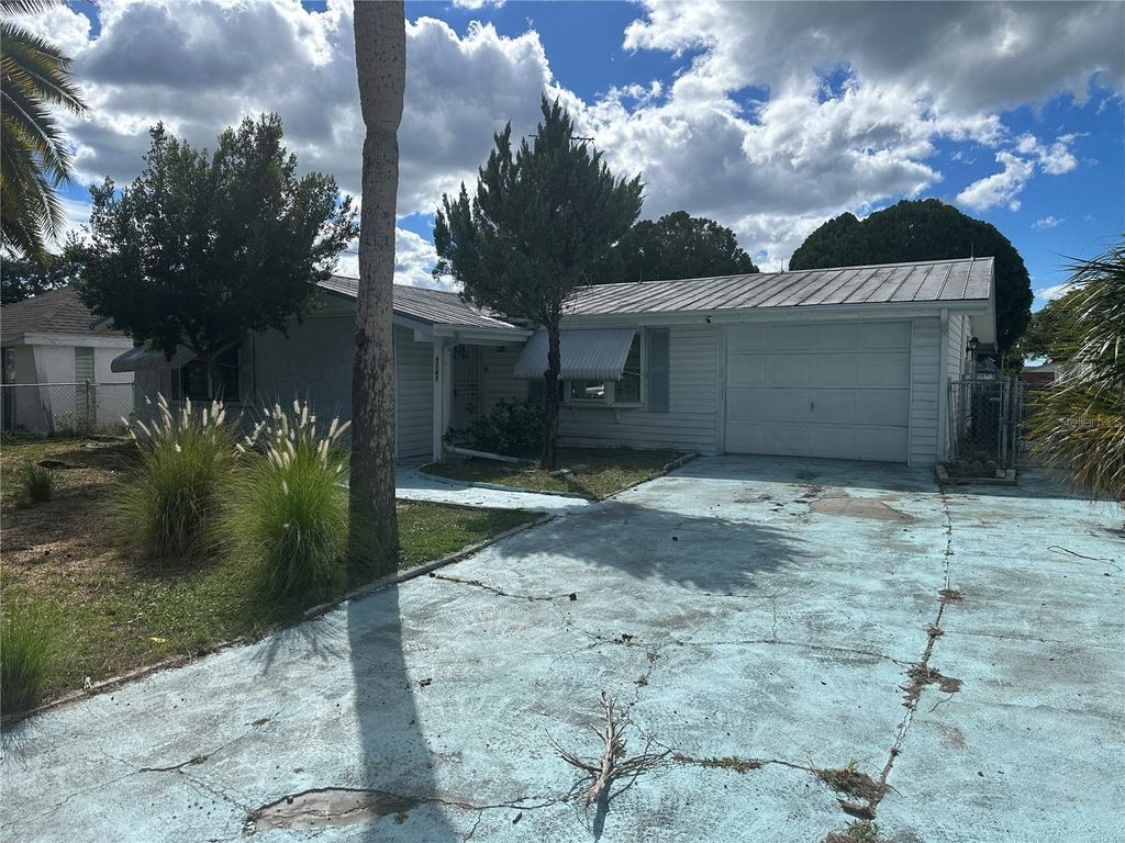 Photo of 9741 Scenic Drive, Port Richey, FL 34668 (MLS # TB8437116)