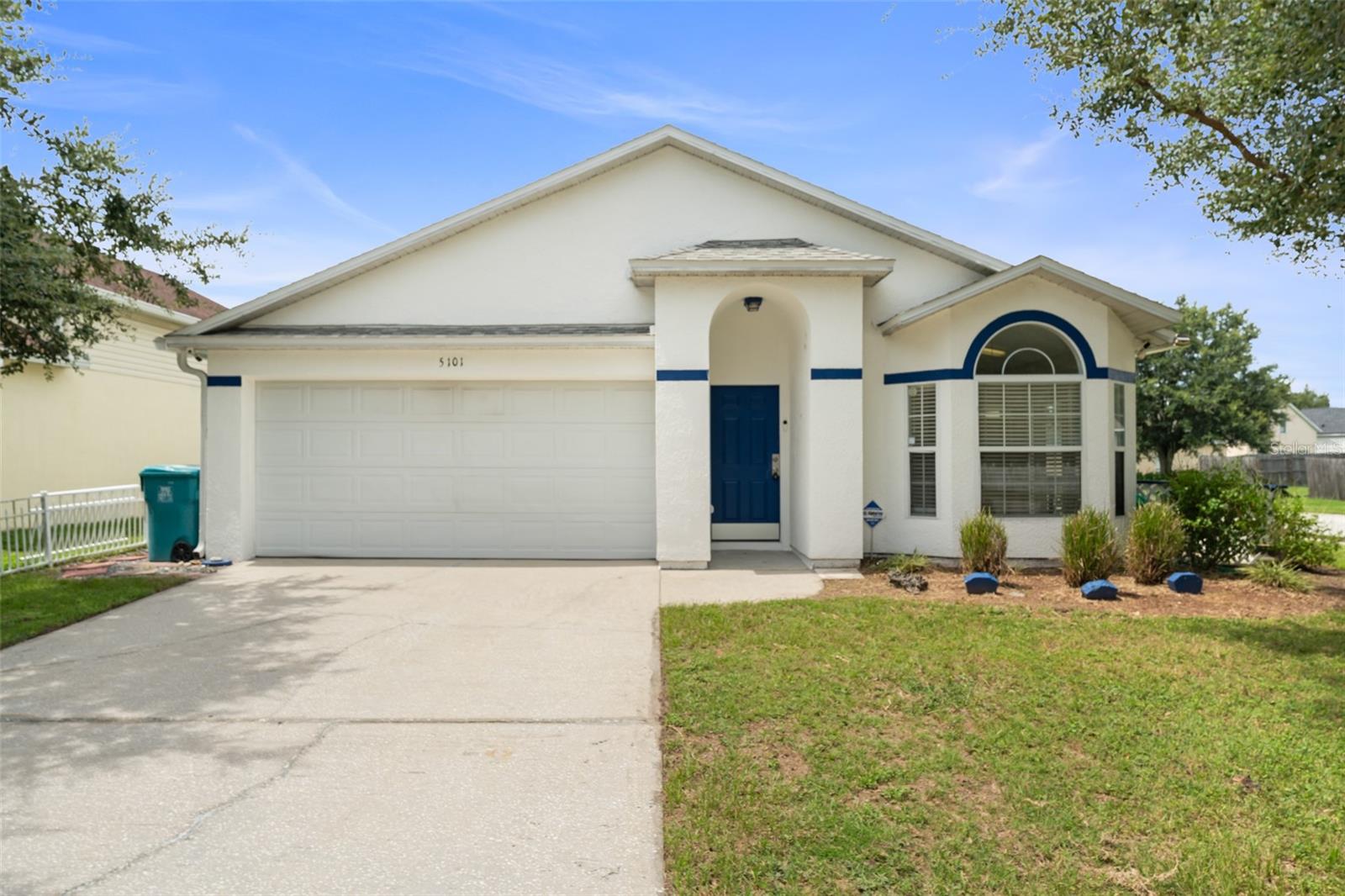 **This property qualifies for a closing cost credit up to $4,400 through the Seller’s preferred lender.**Welcome to 5101 Vista Lago Drive – Where Comfort Meets Possibility! Tucked away on a desirable corner lot, this 3-bedroom, 2-bathroom single-family gem offers just the right blend of character, comfort, and space—complete with a 2-car garage and a layout that’s both functional and inviting. Step through the front door and be greeted by a welcoming foyer that draws your eye down a long hallway, teasing a glimpse into the heart of the home. As you make your way in, the space opens up to a bright and airy living room/dining room combo, highlighted by a vaulted ceiling that adds height and charm. To your right, the kitchen awaits with a cheerful mix of white and wood-toned cabinetry, white appliances, and a cozy breakfast nook framed by a charming bay window that overlooks the front yard. A sliding glass door just off the nook opens to a private, fenced patio—perfect for morning coffee or evening wind-downs. Laminate flooring flows throughout, creating a clean and cohesive feel across the home. The two guest bedrooms come equipped with built-in closets and are just steps away from a full bathroom featuring a tub-shower combo—ideal for guests or family. At the rear of the home, the spacious primary suite offers a peaceful retreat, complete with an ensuite bathroom featuring dual sink vanities, a corner soaking tub, a separate walk-in shower, and a walk-in closet to keep everything organized and tucked away. Step outside and let your imagination run wild—the blank canvas backyard offers ample space for entertaining, gardening, playtime, or creating your dream outdoor oasis. Whether you're looking for your first home or the perfect place to settle in and add your own touch, 5101 Vista Lago Drive is ready to welcome you home.