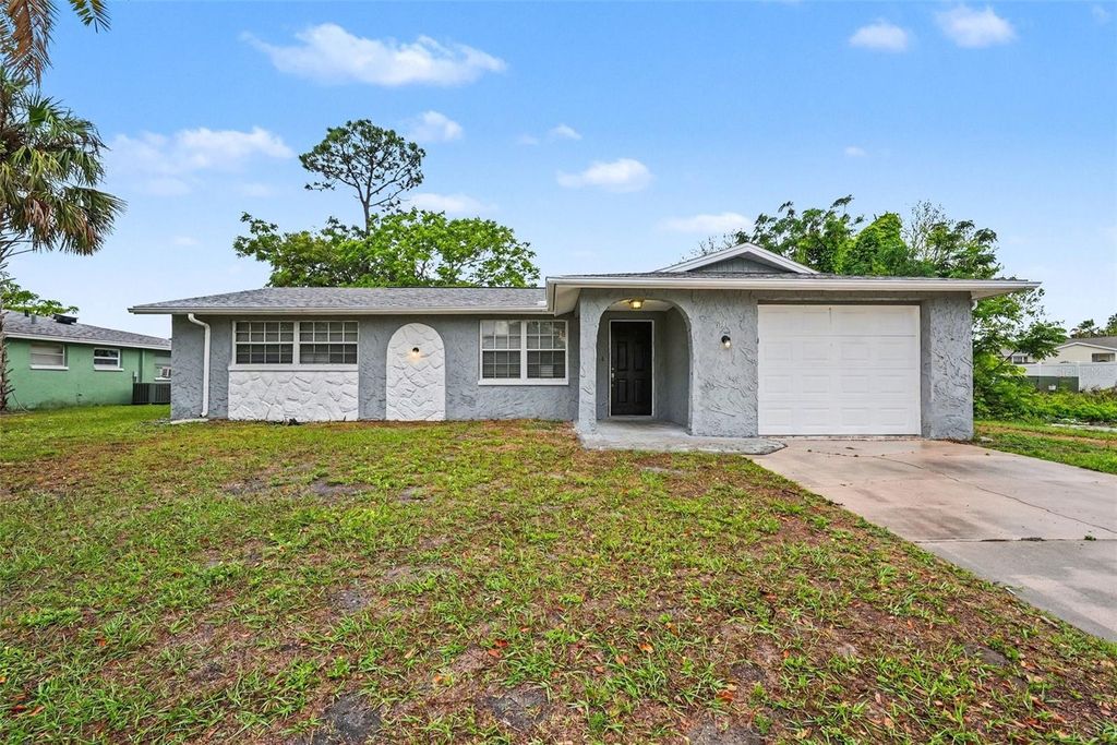 Photo of 9141 Crabtree Lane, Port Richey, FL 34668 (MLS # O6396492)