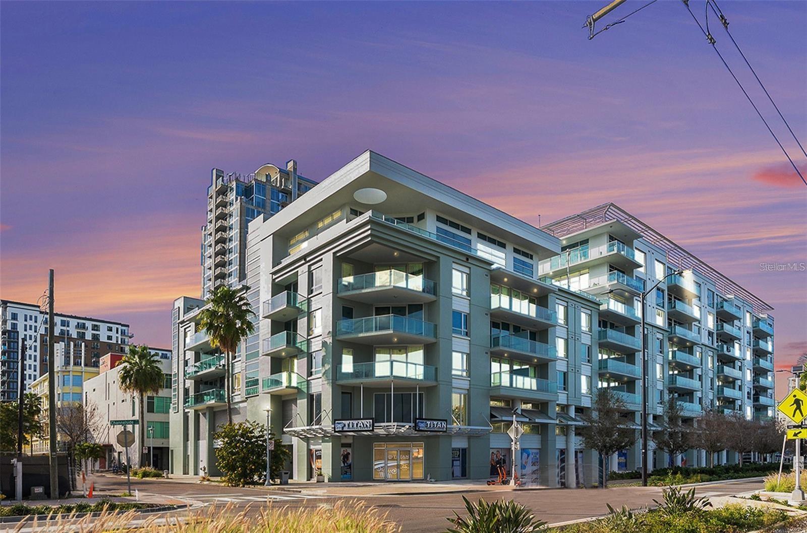 Step into the heart of urban living in Channelside! This stylish condominium, located at 111 12th St. N #1419, offers 2 bedrooms, 2.5 bathrooms, and a Den/flex room, providing ample space and flexibility. Enjoy captivating views of the Port of Tampa, the Florida Aquarium, and the community pool right from your private terrace.
The well-appointed kitchen features granite countertops, modern wood cabinetry, stainless steel appliances, and a built-in wine cooler. Oversized glass doors bring in abundant natural light and connect the open-concept living space to the terrace. The primary suite includes expansive windows, a walk-in closet, and a private en-suite bath. The second bedroom also has its own full bathroom, offering comfort and privacy for guests or residents. A separate half bath is available for visitors. The interior laundry area is thoughtfully positioned for convenience without interrupting living or bedroom spaces. A new HVAC system installed in 2023 ensures year-round comfort.
This unit includes a tandem 2-assigned parking spot garage and an additional flex room ideal for a home office, creative space, or guest area.
Community amenities include a sauna, fitness center, pool (visible from the unit), on-site concierge service, and a dog park located just across the street.
Situated within Tampa’s vibrant Channel District, the home offers walkable access to Sparkman Wharf, Amalie Arena, the Riverwalk, USF Medical School, Curtis Hixon Park, Publix, Starbucks, local museums, and the Crosstown Expressway.
The HOA fee includes basic cable, high-speed internet, building and flood insurance, maintenance of the roof, pool, and common areas, 7-day concierge/security, and on-site management.
Don’t miss out on this exceptional urban living experience in Channelside!