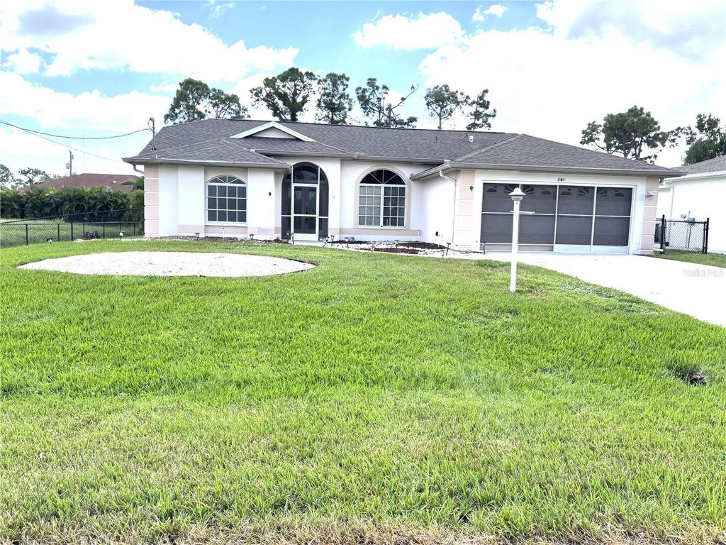 Photo of 257 Broadmoor Lane, Rotonda West, FL 33947 (MLS # D6144109)