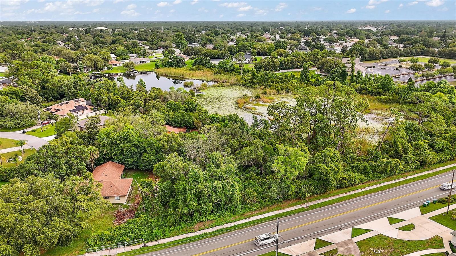 Looking for the perfect place to build your dream home or investment property? Welcome to 1116 Doyle Road, a spacious .27-acre parcel located in one of Deltona’s most convenient and fast-growing areas. Perfectly situated near Publix, Walmart, Aldi, Winn-Dixie, and a variety of popular dining options including Olive Garden, Outback Steakhouse, and local favorites, this homesite offers easy access to Deltona Plaza, parks, and everyday essentials. With proximity to I-4, SR-415, and Howland Blvd, you're just a short drive from both Orlando and the Atlantic Coast beaches. The lot is currently uncleared, allowing you to bring your vision to life on a natural Florida landscape. Key reports have already been completed for your convenience, including a survey and a Comprehensive Wetland Delineation Report confirming the entire parcel is uplands with no wetlands present and no occupied gopher tortoise burrows by previous owners. The soils are sandy and well-drained, and a culvert will be needed over the roadside ditch for driveway access. Whether you're planning your forever home or a long-term investment, this prime piece of real estate offers location, opportunity, and peace of mind—all in one of the most desirable and up-and-coming areas of Deltona.