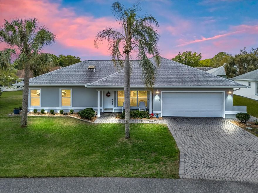 Stonecrest is a 55+ gated golf course community with all the amenities and 4 pools (one indoor), and just a Bridge Away By Golf Cart To The Villages!  Charming 2bedroom/2 bath Concrete +DEN AND LIVING ROOM. CUSTOM BUILT BLOCK AND STUCCO CUSTOM HOME, with a 2 Car Garage, AND workshop (13X5)! ROOF 2026, A/C 2014, WATER HEATER 2014,  The white appliances are newer w/ MICROWAVE HOOD (2020), REFRIGERATOR (2021), & RANGE (2017), WASHER (2017), and DRYER (2017). NEWER LV FLOORING adds a wow to this home upon entry.  You will Love This Open Concept Floor Plan which is Spacious, Light and Bright, just perfect for Gatherings of Friends and Family! This well appointed home boasts a Paver Driveway and Walkway, Professional Landscaping, Covered Front Porch with Retractable Screen door, Vaulted ceilings, an Open Concept Floor Plan, and a Birdcage Enclosed Back Patio with Paver flooring! The Kitchen showcases a Large Skylight, Formica Countertops, White cabinetry, and a Butler's Window the the Florida room, making Entertaining Effortless! A Stunning Chandelier Adorns the spacious Dining Area which flows seamlessly to the 15x14 Living area which offers access to the Florida room, Vaulted ceilings, AND NEWLY PAINTED INTERIOR.  The spacious Primary Suite features a Walk in Closet, and En Suite bathroom. The En Suite bathroom boasts a Tub and Shower Combination, Nice Size Vanity, and a Linen Closet.  Bedroom Two offers a Double Closet providing your guests with Convenience, and Privacy!   Retreat to your own Private Outdoor Oasis, on the 16 x 12 Birdcage Enclosed Back Patio with Paver Flooring, and Privacy Landscaping, Enhancing the Outdoor Living Experience! Enjoy outdoor BBQ's, Sunset Dinners, and the beautiful Florida weather!  A Fantastic additional feature is the Large 13 x 7 Inside Laundry room with a Utility Sink, and Extra Cabinet Space!  You will have plenty of room for storage in the nice size 2 Car with Motorized Screen Doors, and Pull down attic stairs. Stonecrest is a 55+community with private roads, all the amenities, pools, pickleball courts, softball, 18 hole championship golf course, Broad Stripes Golf & So If you are looking for a Well Designed Custom Concrete Block & Stucco home with a Fantastic Open Concept Floor Plan, in a Fabulous Location with Great Outdoor Space in a Secure Community Setting, then This is the Home for You!   A WONDERFUL LIFESTYLE AWAITS YOU IN STONECREST!  SOME FURNISHINGS AVAILABLE SEPARATELY.