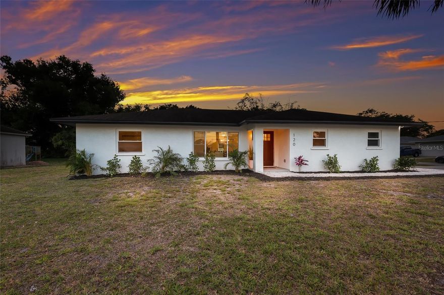 NW BRADENTON STUNNER WITH LARGE FENCED IN YARD!!! From the moment you arrive, this beautifully UPDATED 4 BEDROOM residence makes a lasting impression with its clean lines, fresh exterior palette, and inviting curb appeal. NO HOA/DEED RESTRICTIONS, NO FLOOD INSURANCE! Perfectly positioned on an oversized corner lot, the property offers a sense of space and privacy that is hard to find, while newly refreshed landscaping enhances the home’s crisp, modern look. A spacious driveway leads to the 2 car garage (single stall door), and warm exterior lighting highlights the welcoming front entry. Step through the front door into a light and bright interior where every detail has been thoughtfully reimagined.  Wide plank flooring flows seamlessly throughout the home, complemented by fresh paint, modern fixtures, and an open, airy layout designed for today’s lifestyle. The main living area offers an expansive gathering space filled with natural light, enhanced by recessed lighting and oversized windows. The layout effortlessly connects the living room to the dining area, creating the perfect setting for both everyday living and entertaining. The kitchen has been completely transformed into a stylish and functional centerpiece, featuring sleek white cabinetry, quartz countertops, stainless steel appliances, and a striking vent hood that anchors the space. A large peninsula with bar seating provides the ideal spot for casual dining or hosting guests, while ample cabinet and counter space ensures both beauty and practicality. The open flow into the dining area allows for easy entertaining and a true sense of connectivity throughout the home. The primary suite offers a peaceful retreat with generous proportions, abundant natural light, and a clean, modern aesthetic. The en suite bathroom has been fully renovated with a designer touch, featuring a new vanity, updated fixtures, and a beautifully tiled walk in shower that creates a spa like experience. Every element has been thoughtfully selected to provide both comfort and style. Three additional bedrooms offer flexibility for family, guests, or a home office, each featuring the same updated flooring, fresh finishes, and plenty of natural light. The secondary bathroom has also been completely renovated with modern tilework, updated cabinetry, and a cohesive design that mirrors the quality seen throughout the home. Step outside to discover one of the property’s most impressive features, an expansive, fully fenced backyard offering exceptional privacy and endless possibilities. Set on this oversized corner lot, the outdoor space is both functional and serene, highlighted by mature avocado trees, coconut palms, and a mango tree that create a lush, tropical setting. Whether you need space to store a boat, create a custom pool, or simply enjoy wide open outdoor living, this yard delivers! The oversized covered and screened lanai provides the perfect extension of the living space, ideal for relaxing or entertaining year round, while the additional open patio offers even more room to gather! Additional upgrades include newer windows, a new hot water heater, and updated landscaping, providing peace of mind and move in ready convenience. Perfectly positioned in a highly desirable central location, this home is just minutes from the world renowned beaches of Anna Maria Island,  IMG Academy, St. Stephens and the vibrant dining, shopping, and waterfront attractions of downtown Bradenton. DO NOT WAIT ON THIS ONE!!!