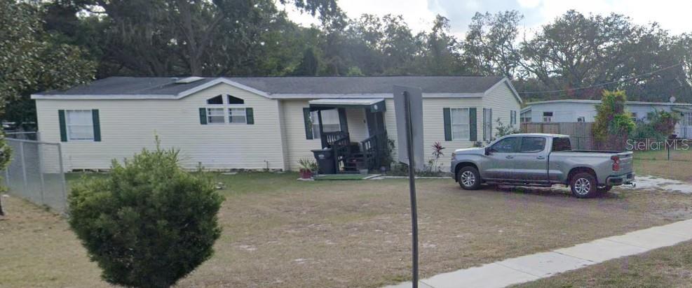 Photo of 2007 E 148th Avenue, Lutz, FL 33549 (MLS # TB8552391)