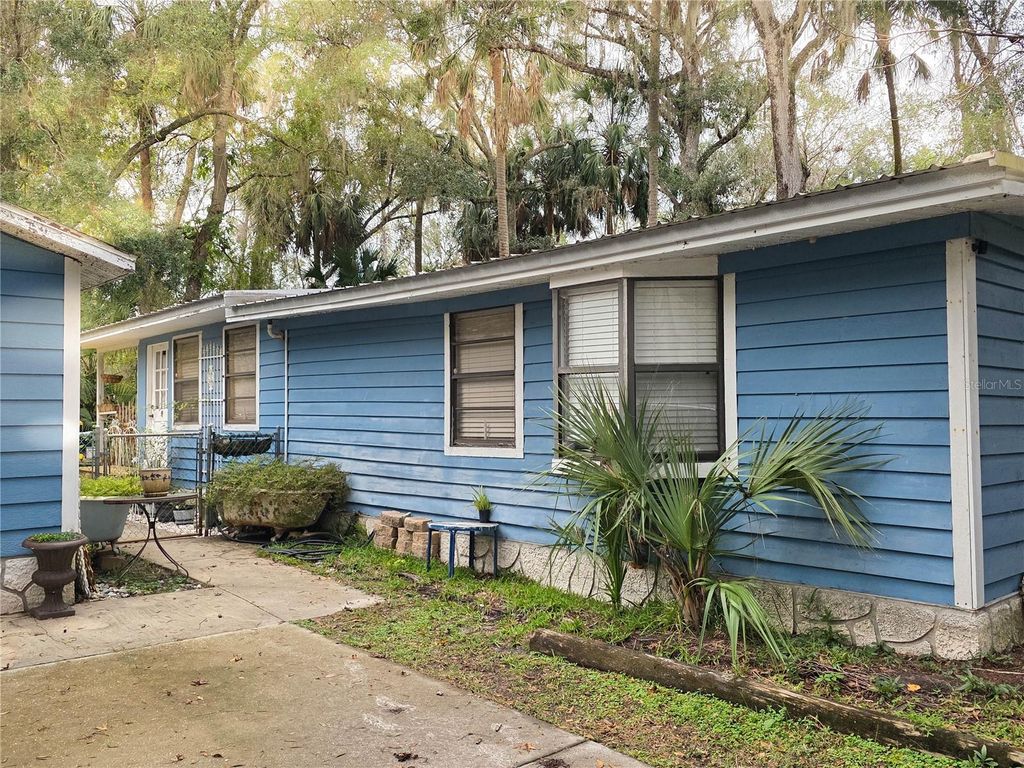 Photo of 13212 E Shawnee Trail, Inverness, FL 34450 (MLS # TB8456014)