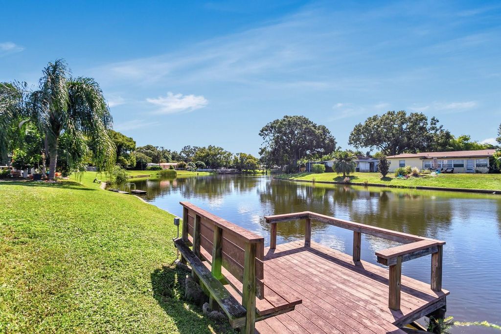 Photo of 4864 Lake Charles Drive N, Kenneth City, FL 33709 (MLS # TB8437285)