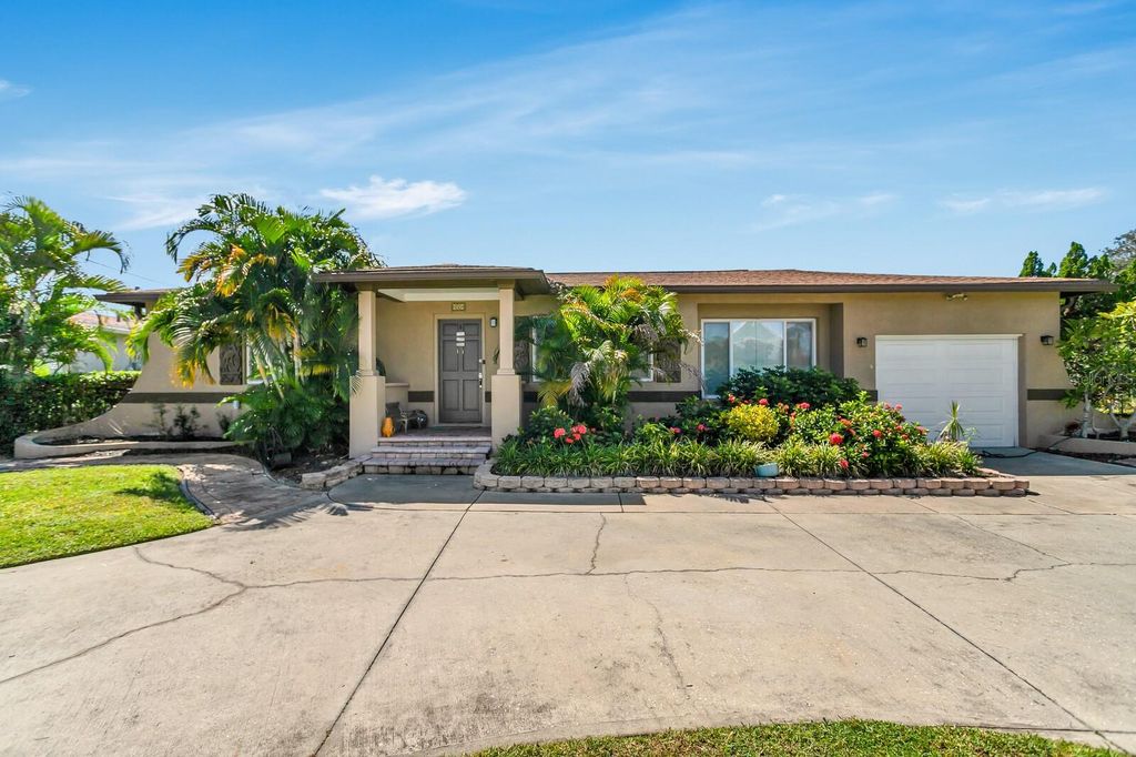 Photo of 4864 Lake Charles Drive N, Kenneth City, FL 33709 (MLS # TB8437285)