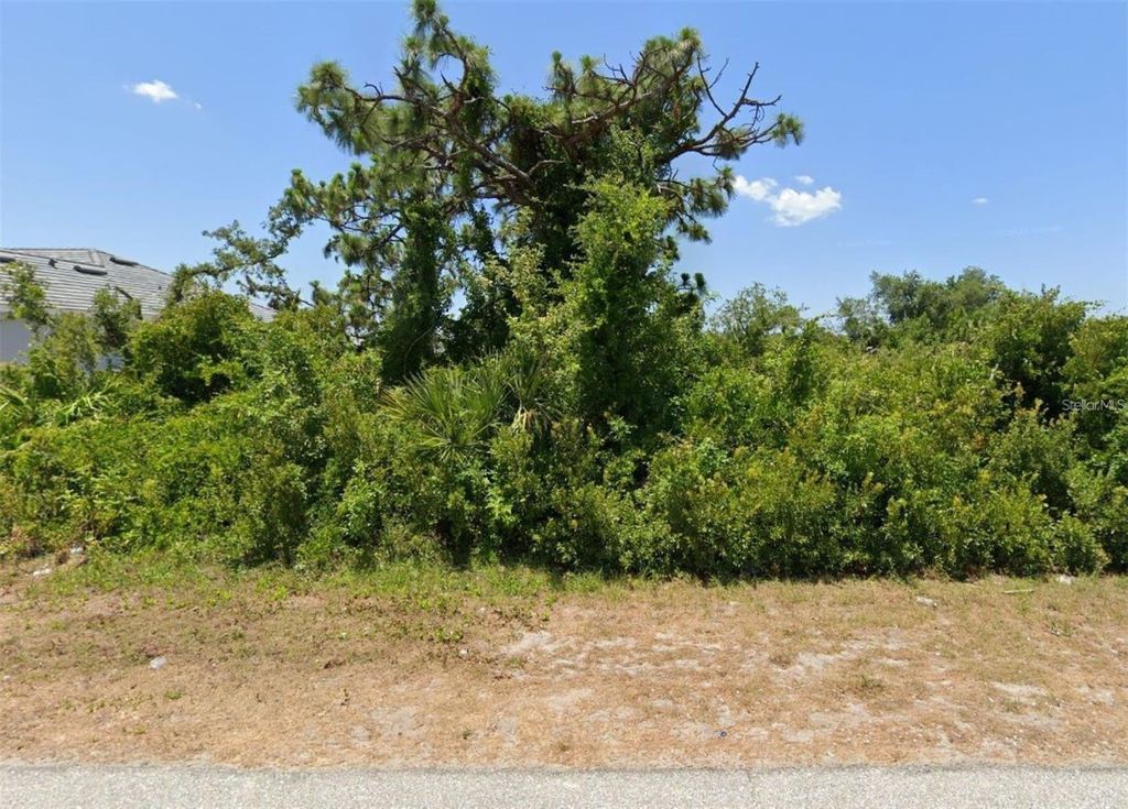 Photo of 13349 Gershwin Lane, Port Charlotte, FL 33981 (MLS # A4668355)