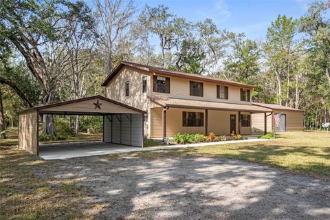 Photo of 12047 Timber Lane, Brooksville, FL 34601 (MLS # W7881662)
