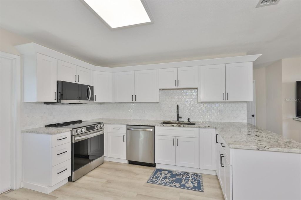 Photo of 4718 W Oklahoma Avenue, Tampa, FL 33616 (MLS # TB8482972)