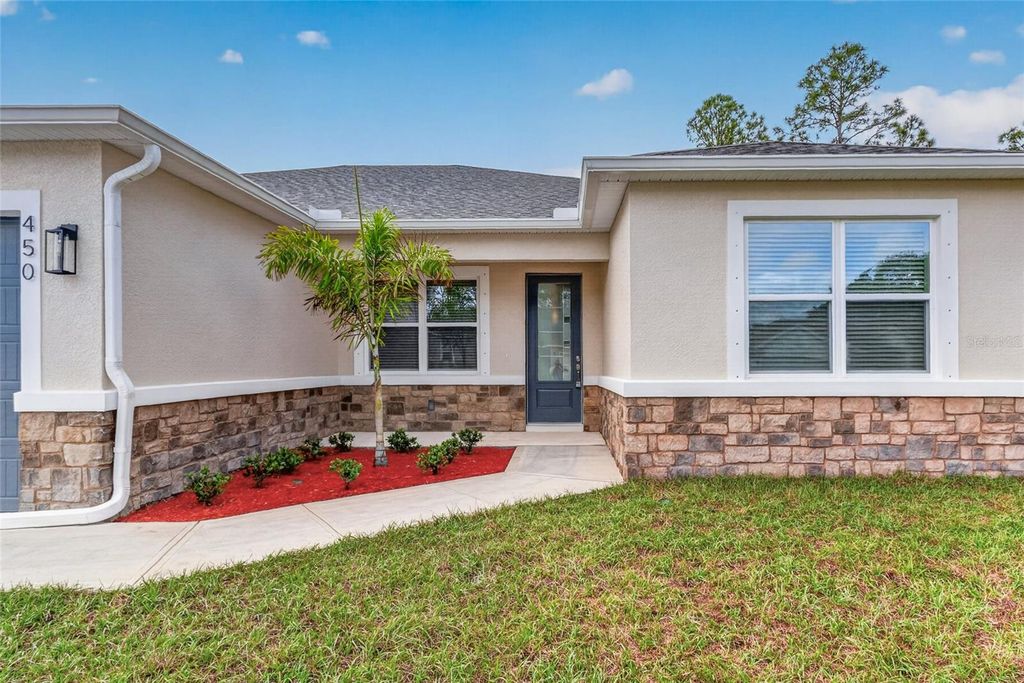 Photo of 450 Hammond Street SW, Palm Bay, FL 32908 (MLS # OM721297)