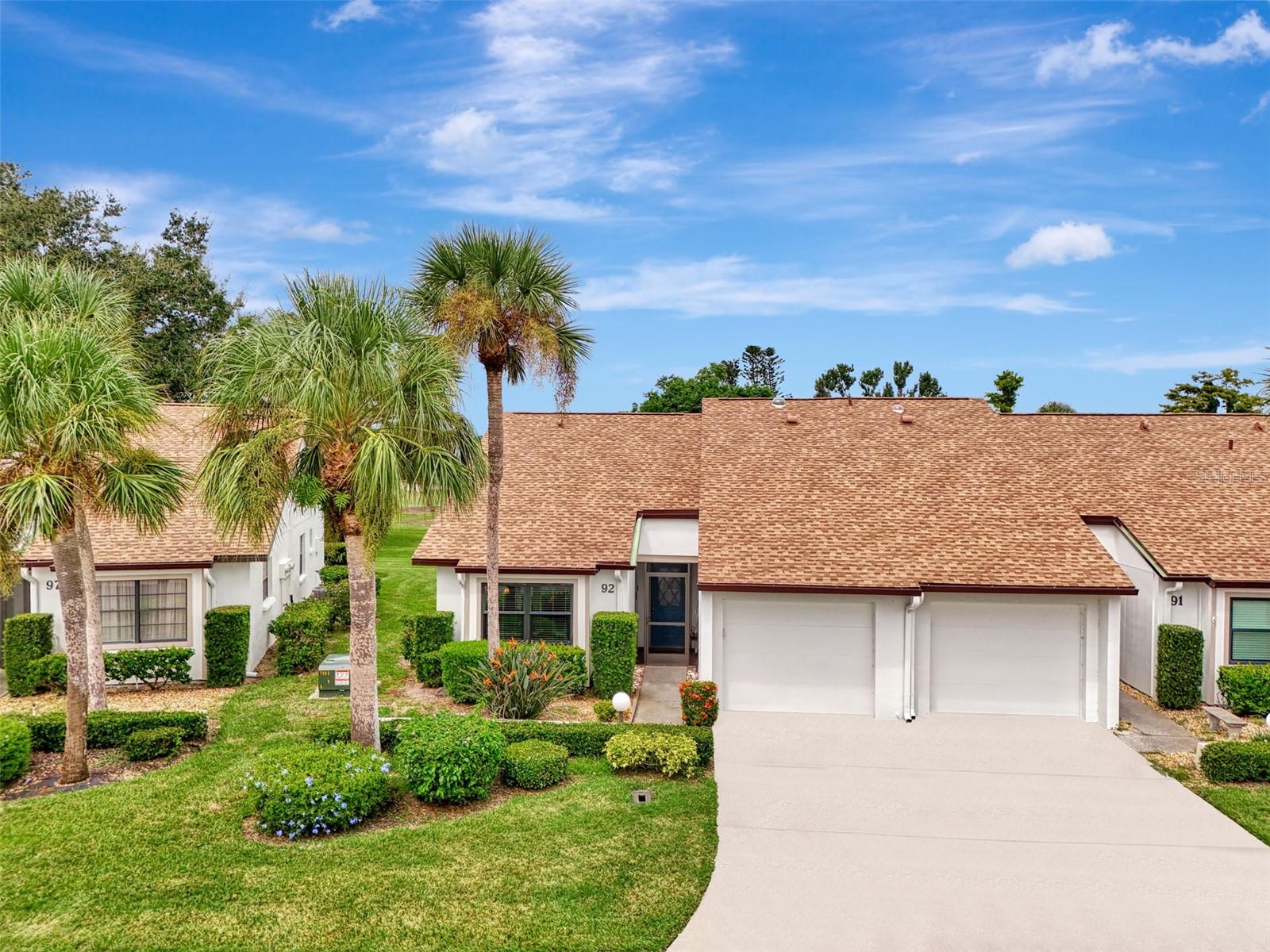 Appealing two bedroom, two bath, end unit villa, with attached garage, and private golf course views. This turnkey furnished villa is in the desirable community of Fairways of Capri, just off of popular Capri Isles Blvd. and surrounded by Capri Isles Golf course. Your villa features a combination dining room, living room area, that has a vaulted ceiling with a skylight. Pocket sliding doors from the living room to your lanai with a private view of the 14th hole and green of Capri Isles Golf Club. The master bedroom has a large walk-in closet and the master bathroom has a remodeled shower, marble top vanity and a new comfort height toilet in 2025. Both bathrooms have travertine floors and the guest bath has a marble top vanity too. The kitchen is remodeled with granite counter tops, stainless appliances, tiled backsplash, crown molding and new cabinetry. There is a skylight in the kitchen and large closet pantry in the hallway. Impact, storm rated windows, were installed in 2021. The roof was replaced in 2021 and the exterior was painted in 2025. Water heater was replaced in 2024. The community offers a heated pool and clubhouse. Great central location within 4 miles to charming downtown Venice and the beaches of the Gulf of America. Come see this great buy today!