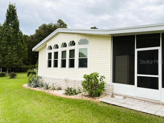 Photo of 122 Tamarisk Way, Leesburg, FL 34748 (MLS # G5118859)