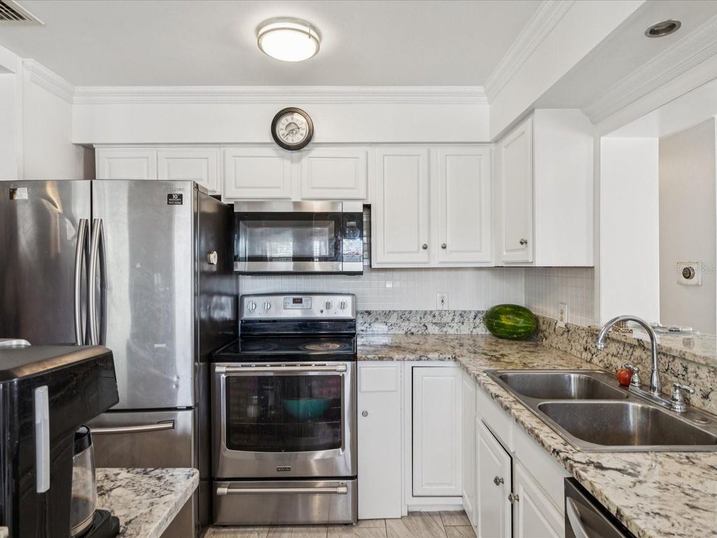 Photo of 6518 S West Shore Circle, Tampa, FL 33616 (MLS # TB8448651)