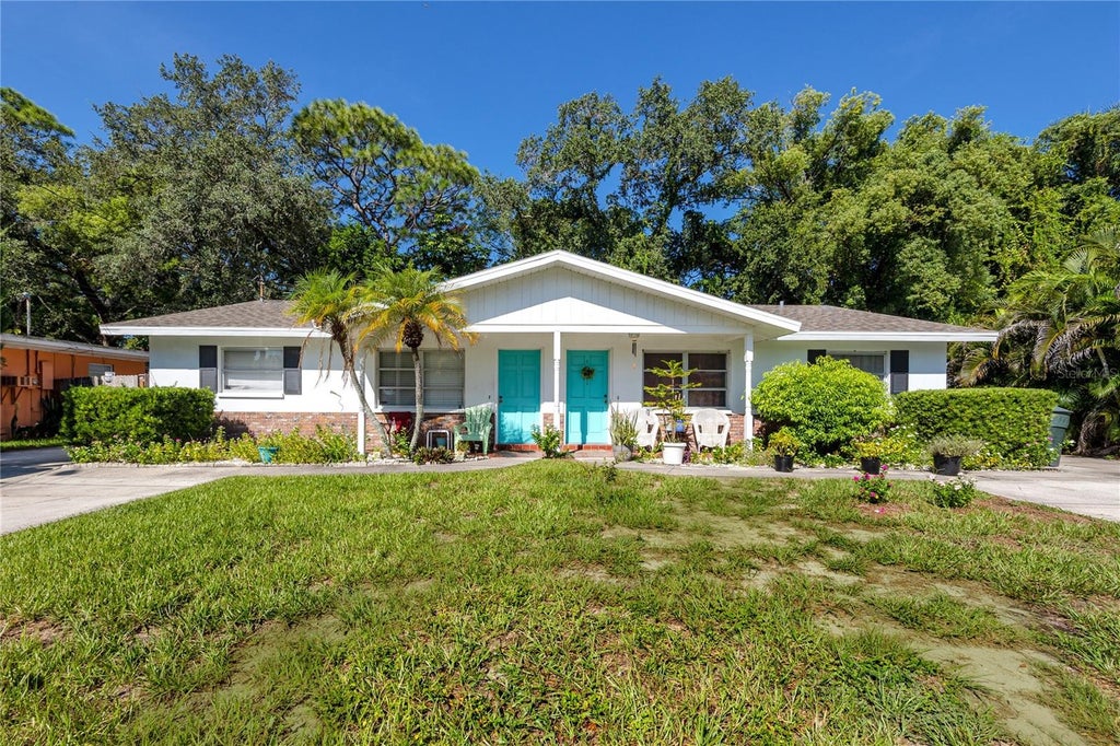Photo of 332 Acropolis Drive, Dunedin, FL 34698 (MLS # TB8549580)