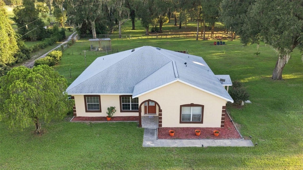 Photo of 1050 NE 165th Street, Citra, FL 32113 (MLS # O6437527)