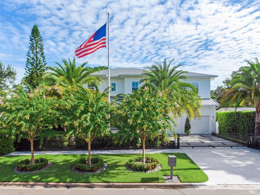 **SEE MATTERPORT FOR TOUR! PUSH CIRCLES TO WALKTHROUGH!** This coastal designed villa is to die for and must be seen in person to truly appreciate. The quality and all the features are over the top...it's resort living! The coastal design on the outside radiates Florida living with the special landscaping and the inside contemporary design has a very intimate feeling...just not cold contemporary. There are many extra features in the house starting with the outside gated fencing, luxury turf yard, special front trees, formal hedging and unique small leaf tropical palms along the resort-style pool and terrace and of course state of the art irrigation. There is a large roll-out TV for the pool and lounge. The terrace to the pool and house has automatic screens, a large ceiling fan, wall-mounted TV and outdoor kitchen which is all furnished. Get this, an auxiliary AC unit is in the open terrace to cool down the extra hot days. All the doors stack back opening the large family room for indoor/outdoor entertainment. There is a natural gas generator for the entire house and length of time needed. Inside the house has wainscoting, wood baseboards and crown moldings, some ceilings have moldings and are coffered. The white chef's gourmet kitchen and breakfast area is a dream of Liebherr appliances - 60" refrigerator/freezer, dishwasher and ice machine, along with custom water fall countertop and marble backsplashes. One can seat people at the counter or on the side breakfast area with an awesome chandelier. In additions, there is a butler's pantry with a wine fridge and a huge walk-in pantry. The chef's kitchen of course, opens to the large family room and adjacent terrace. The mud room is next to the kitchen and the 2 ½ high ceiling garage also houses the downstairs washer and dryer. The house keepers dream, one utility room is on the 1st floor and one on the 2nd. An added extra is the great ensuite bedroom with access to the outdoor pool and gardens on the east side of the home. Of course, the second floor is a dream living, with 3/4 bedrooms. The master is large and has two large his-and-hers closets adjacent to the "Hollywood Star* bathroom - with wet showers, large tub room and great separate vanity with cabinets and sinks covering two entire walls. One item of "extraordinaire" is every toilet in the house is an automatic all-in-one Todo. The other bedrooms, have the same villa quality; one is an ensuite and the other has a *Jack-and-Jill to the media/recreation room and morning kitchenette with refrigerator in case someone needs a fifth bedroom. Indeed, this resort is a winner, a deal of a buy and worth seeing in person.