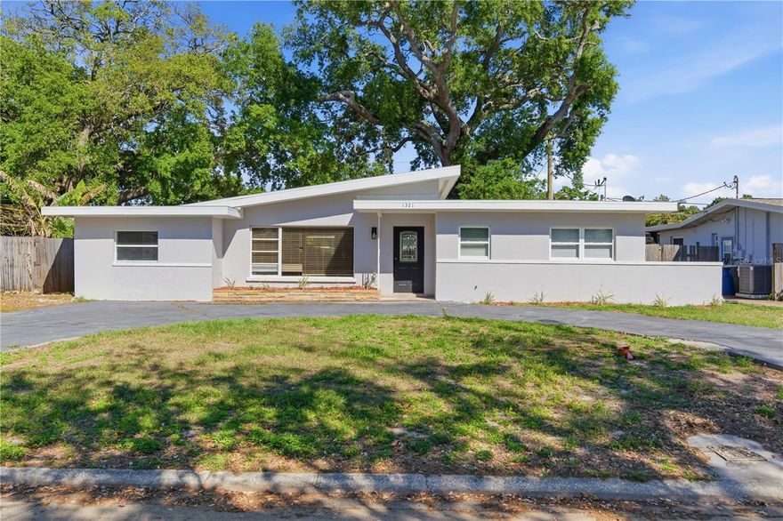 Welcome to your dream lakefront home in Clearwater, Florida! This beautifully fully remodeled 3 bedroom, 2 bathroom mid-century modern residence is perfect for those who appreciate timeless design paired with modern upgrades.
Step inside to discover a bright, open-concept layout with abundant natural light, and seamless indoor-outdoor flow that mid-century enthusiasts love. The brand-new kitchen is a true showstopper, featuring elegant quartz countertops, stylish cabinetry, and new appliances—ideal for both everyday living and entertaining. Each of the two bathrooms has been thoughtfully redesigned with contemporary finishes, complementing the home’s iconic aesthetic.
Enjoy peace of mind with major upgrades already completed in addition to the full interior remodel, including a brand new roof (2025), all-new electrical throughout the entire home (2025), and newer windows for improved efficiency and comfort.
Take in breathtaking lakefront views and enjoy peaceful mornings and stunning sunsets right from your yard overlooking Lake Lucille. This home is not in a flood zone and has never flooded (Flood Zone X). The huge yard offers endless possibilities—whether you envision hosting gatherings, adding a pool, or creating your own private outdoor oasis.
Ideally located just minutes from Clearwater’s world-famous beaches, you’ll have easy access to soft white sands and the Gulf’s sparkling waters. You’re also conveniently close to a wide variety of restaurants, shopping, and local attractions, making it easy to enjoy everything this vibrant area has to offer.
This move-in-ready lakefront mid-century modern gem combines character, quality upgrades, and an unbeatable location—don’t miss your opportunity to own a truly special home!