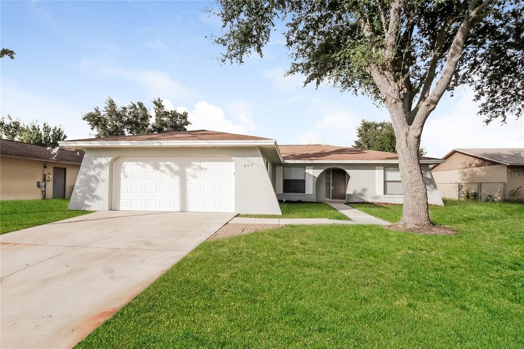 Photo of 607 Estrada Lane, Kissimmee, FL 34758 (MLS # O6367101)