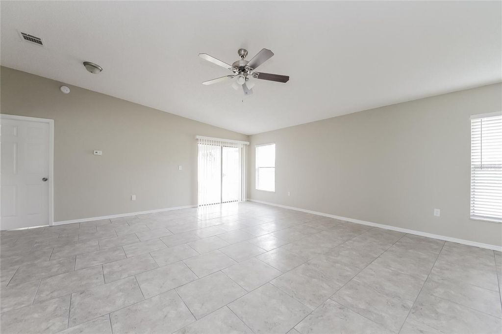 Photo of 607 Estrada Lane, Kissimmee, FL 34758 (MLS # O6367101)