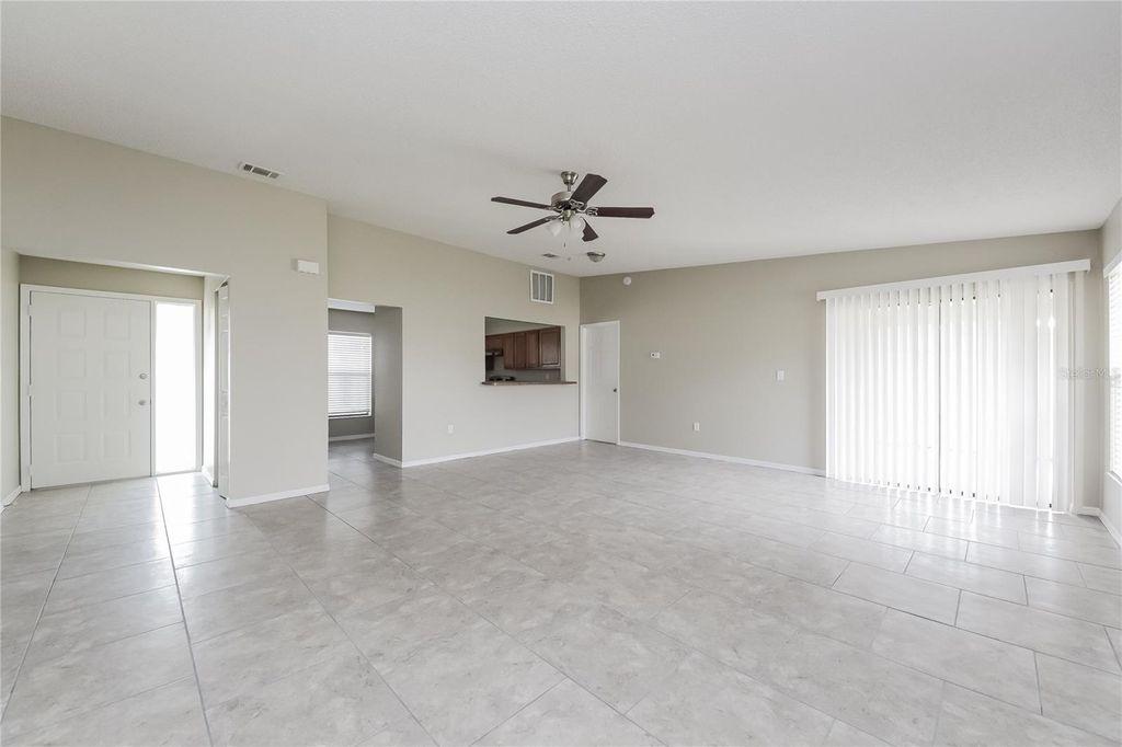 Photo of 607 Estrada Lane, Kissimmee, FL 34758 (MLS # O6367101)
