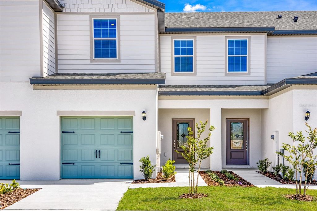 Photo of 824 Poppy Lane, Dundee, FL 33838 (MLS # TB8434392)