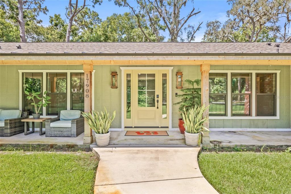 Photo of 17908 Pepper Tree Lane, Lutz, FL 33548 (MLS # TB8414155)