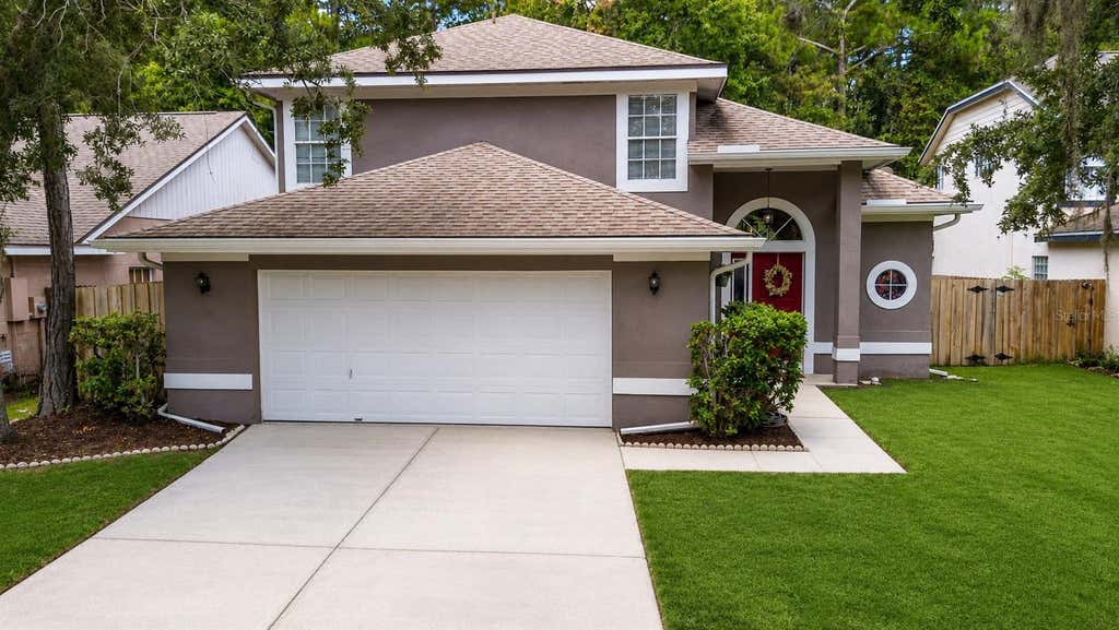 Photo of 10561 Satinwood Circle, Orlando, FL 32825 (MLS # NS1088759)